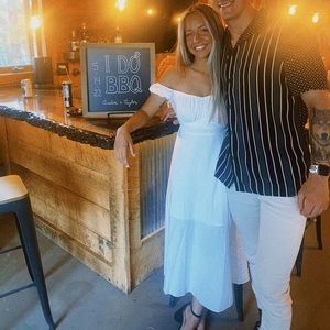 Off the shoulder White midi dress.